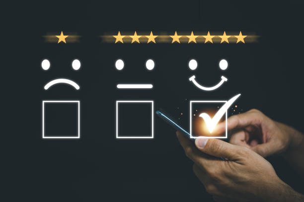 istock Businessman pressing smile emoticon icon on virtual touch screen. Customer service evaluation concept. 1356909571