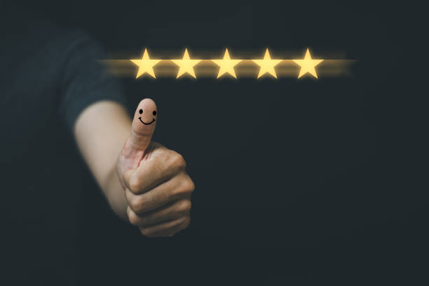 istock Businessman pressing smile emoticon icon on virtual touch screen. Customer service evaluation concept. 1356909572