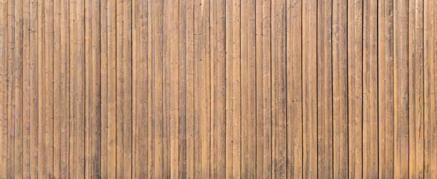 istock Brown, old, soiled by weathering panoramic wooden wall 1356909768
