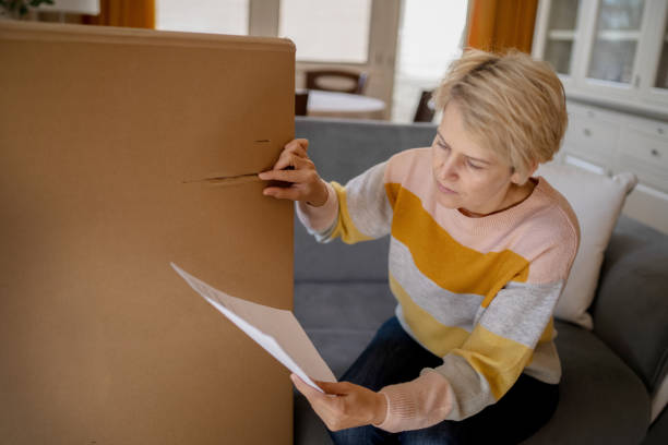 istock A female consumer checks her invoice 1356910706