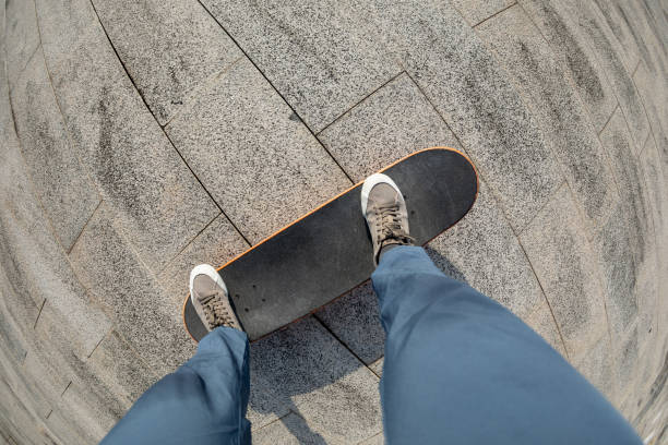 istock Skateboarder skateboarding outdoors in city 1356911953
