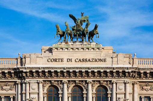 Rome, Italy - October 9, 2020: Quadriga at the top of Palace of Justice seat of Supreme Court of Cassation (Corte di Cassazione), majestic building on the Tiber River