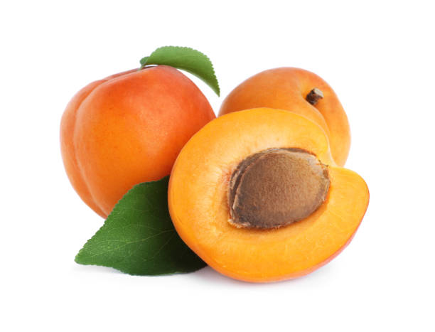 istock Delicious fresh ripe apricots on white background 1356912893