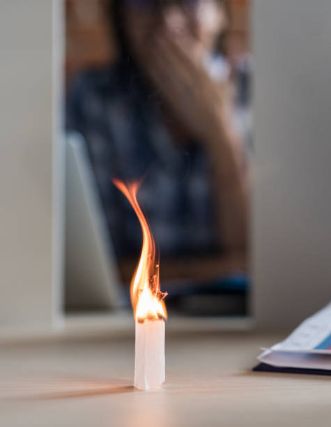 istock Burning paper in the office! 1356914206