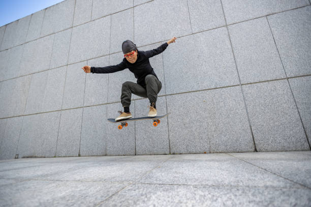 istock Skateboarder skateboarding outdoors in city 1356914436