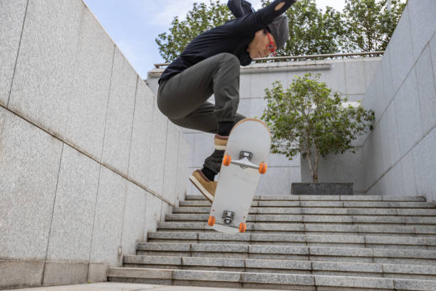 istock Skateboarder skateboarding outdoors in city 1356914446