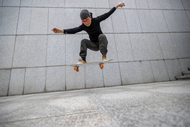 istock Skateboarder skateboarding outdoors in city 1356914477