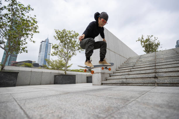 istock Skateboarder skateboarding outdoors in city 1356914483