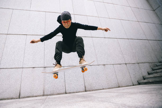 istock Skateboarder skateboarding outdoors in city 1356918206