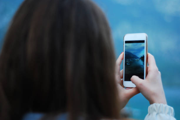 istock Taking photos with smart phone 1356918210