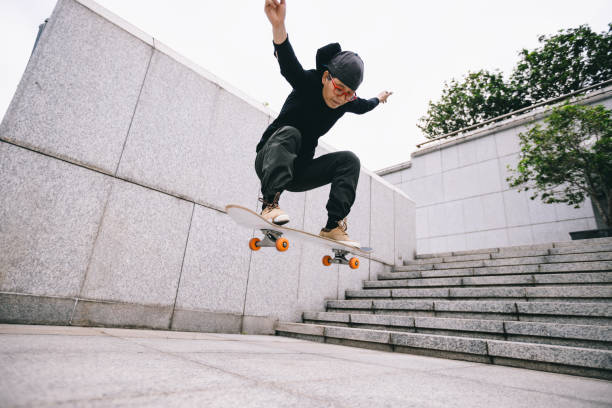 istock Skateboarder skateboarding outdoors in city 1356918231