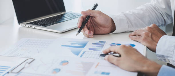 istock Professional Business teamwork conference project success financial statistics growth profit, Partner meeting business investor working start up project for both company with document data graph 1356923701