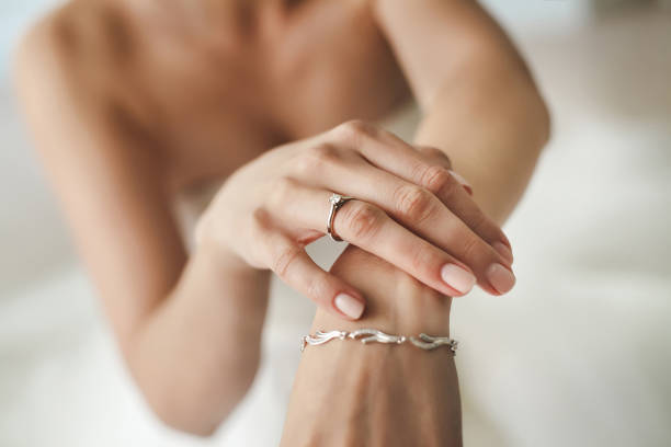 istock The bride's hands. Beautiful ring and bracelet 1356928070