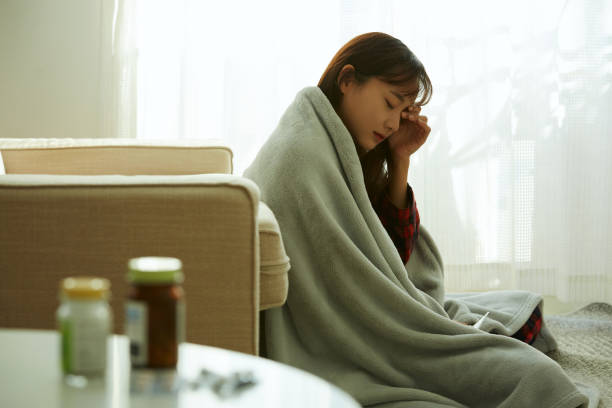 istock Young woman in poor health 1356933425