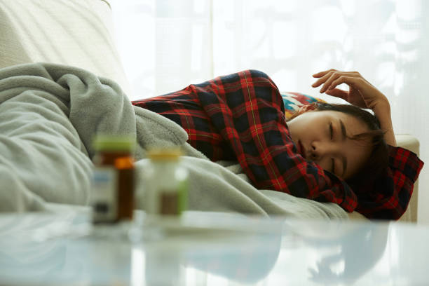 istock Young woman in poor health 1356933504
