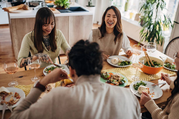 istock Group of friends on dinner party 1356934756