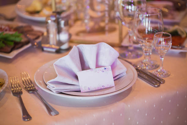 istock Card with a name on the festive wedding table. 1356934901