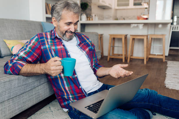istock Man having an online business talk from his house 1356935432