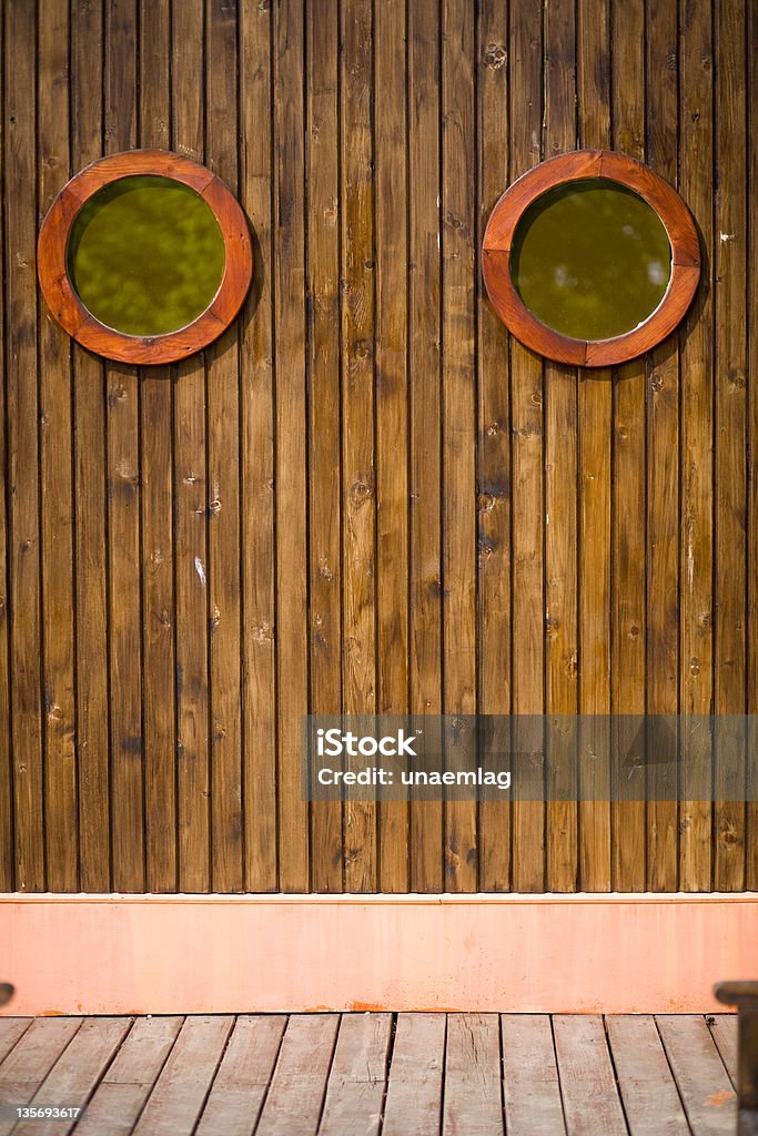 古い木製の壁に portholes - 囲み塀のロイヤリティフリーストックフォト