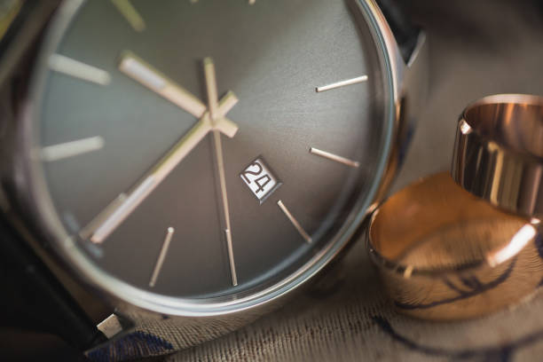 istock Wedding rings and alarm clock, happiness and love 1356936871