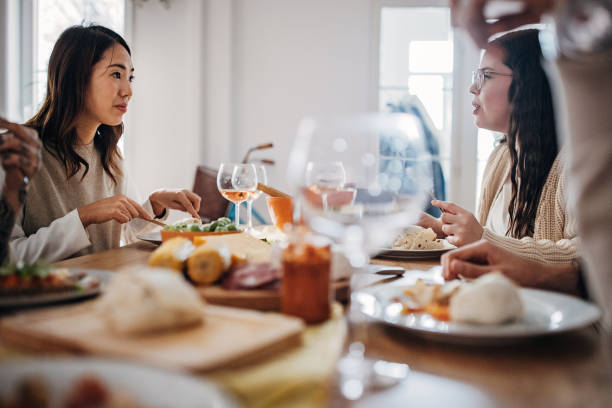 istock Women on dinner party 1356938253