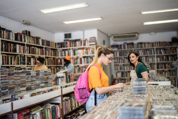 istock Saleswoman helping customer in a thrift store 1356940617