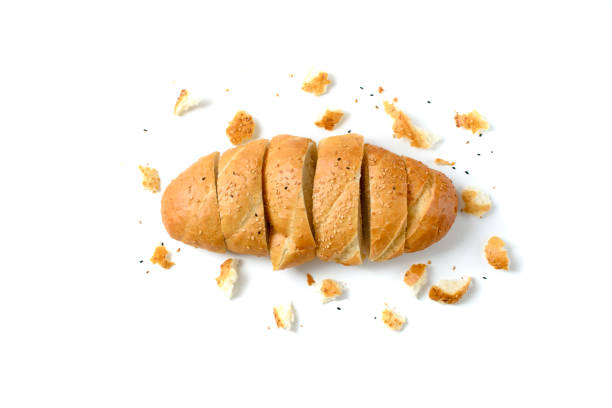 istock sliced sesame bread and bread crumbs on a white background 1356946232