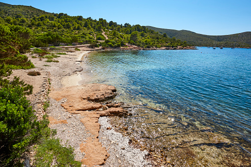 Turquoise waters in Cabrera island shoreline landscape. Balearic islands. Spain