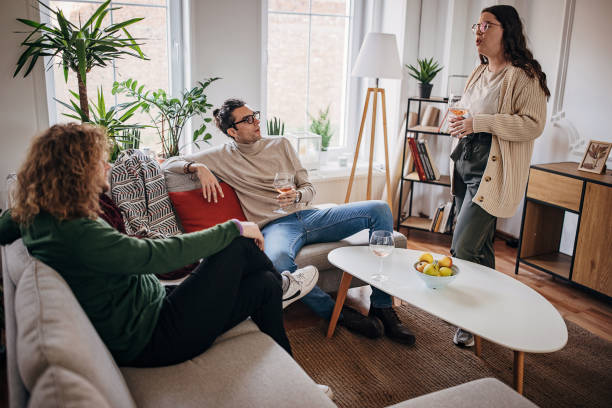 istock Friends in living room 1356947682
