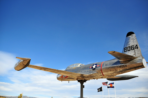 Fort Garland, Costilla County, San Luis Valley, Colorado, USA: 1948 United States Air Force Lockheed  T-33A Shooting star on a roadside plinth, serial #57-6560, tail 138064 - Veteran’s Memorial Park, U.S. Highway 160. The T-33 was developed as a two-seat version of the Lockheed F-80C fighter-bomber. Lockheed produced 5,691 T-33s from 1948 to 1957. Canadair manufactured 656 T-33s under license as CT-133 \