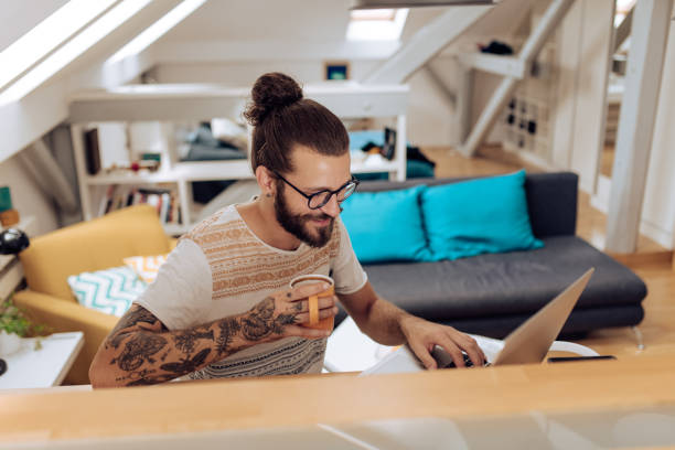 istock Portrait of an adult student learning online 1356952829