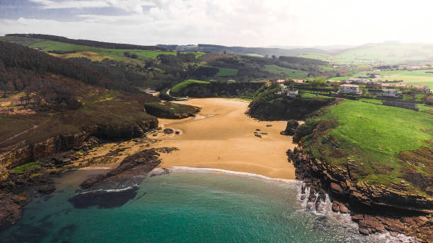 Cantabria beach drone view of Galizano beach in north of Spain cantabria photos stock pictures, royalty-free photos & images