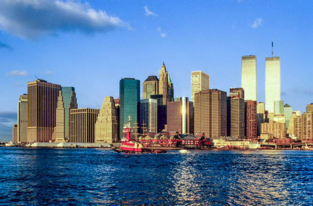 New York, USA - February 22, 1997: twin towers on a sunny day with skyline in New York, USA.