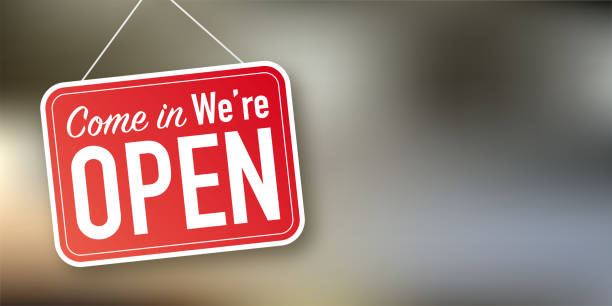 istock Come in we re open hanging sign on white background. Sign for door. Vector stock illustration 1356959000