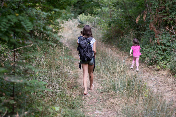 istock Children running in nature 1356959096