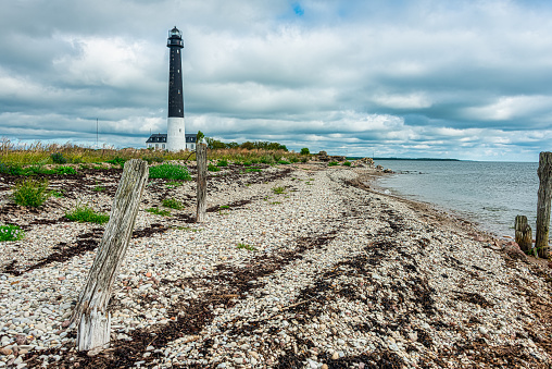 Sightseeing in Saaremaa island. Sõrve Tuletorn (Sörve lighthouse) is a popular landmark and scenic location on the Baltic sea coast, Estonia 03.08.2020
