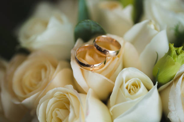 istock wedding bouquet and rings 1356960095