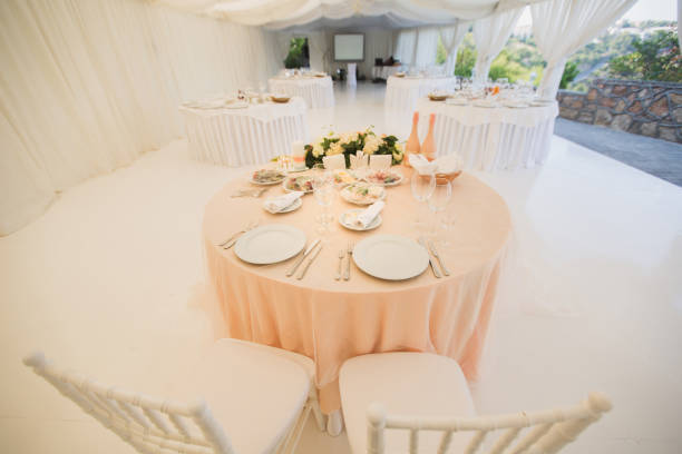 istock Beautiful Banquet hall under a tent for a wedding reception. 1356960121