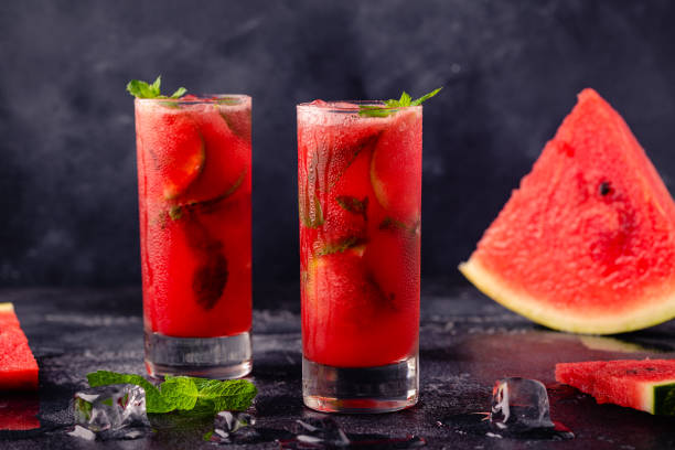 istock Watermelon alcoholic or non-alcoholic cocktail, mojito cocktail with mint and lime. 1356961813