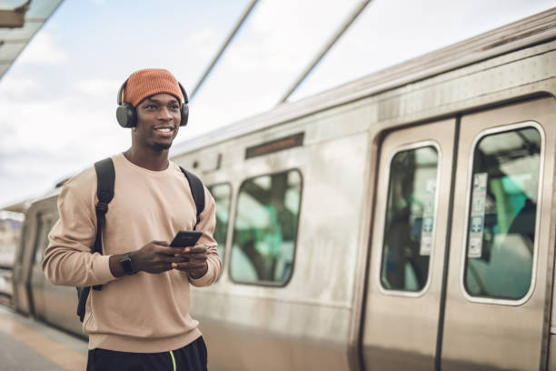 istock A young black man goes to training, passing by a subway station 1356964376