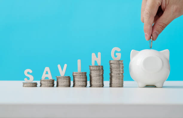 istock Word saving on heap of coins 1356966185