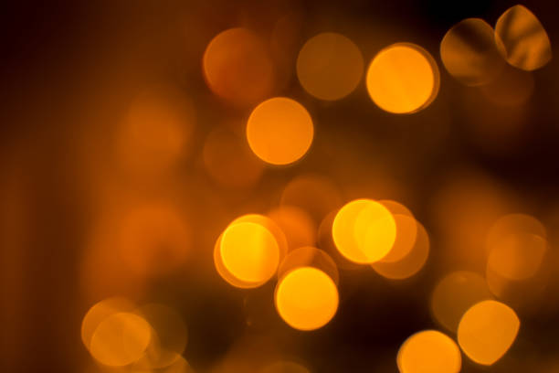 istock Blurry bokeh light from Christmas tree garland. Defocused abstract Christmas light 1356967553