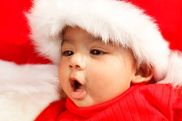 istock Beautiful baby wearing Santa hat 135697633