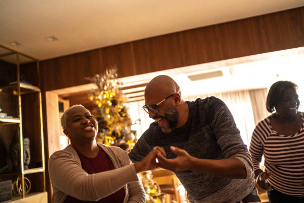 istock Mature couple dancing on Christmas day at home 1356976485