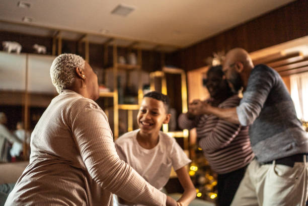 istock Family dancing at home 1356976666