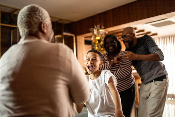 istock Family dancing at home 1356976667