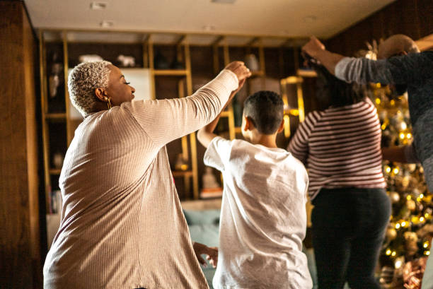 istock Family dancing at home 1356976669