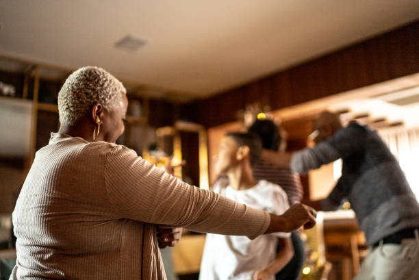 istock Family dancing at home 1356976677