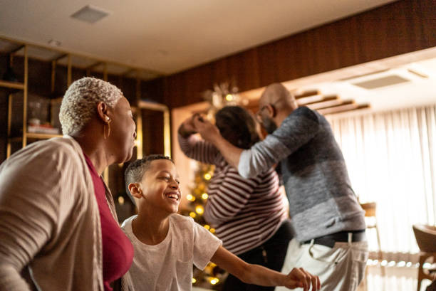 istock Family dancing at home 1356976680