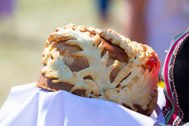 Traditional Slavic loaf in female hands.